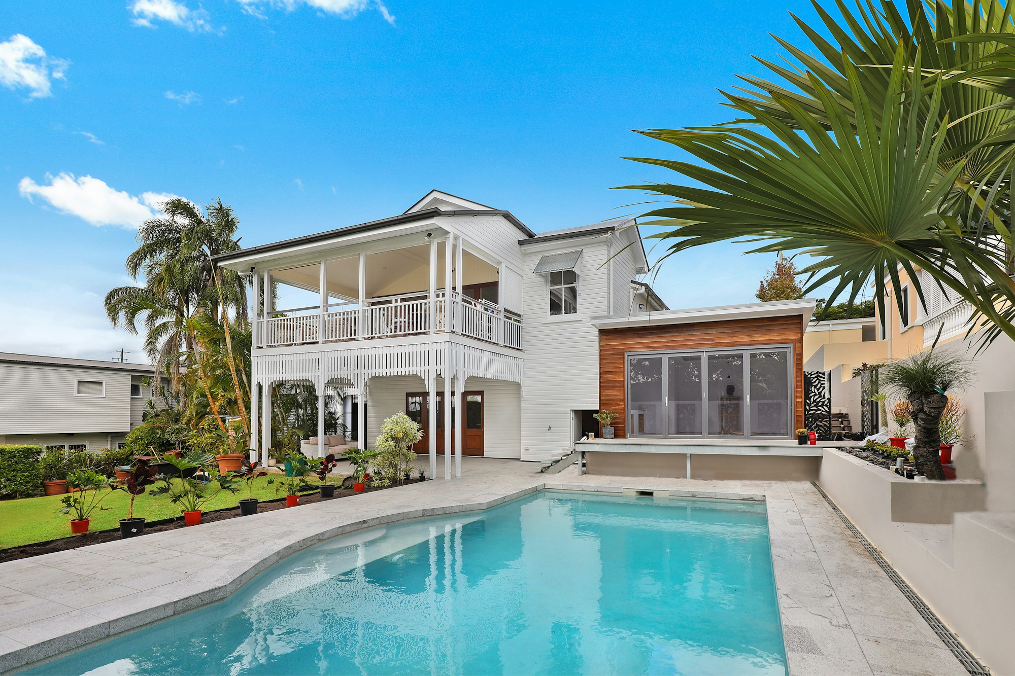 Modern home exterior with landscaped front yard